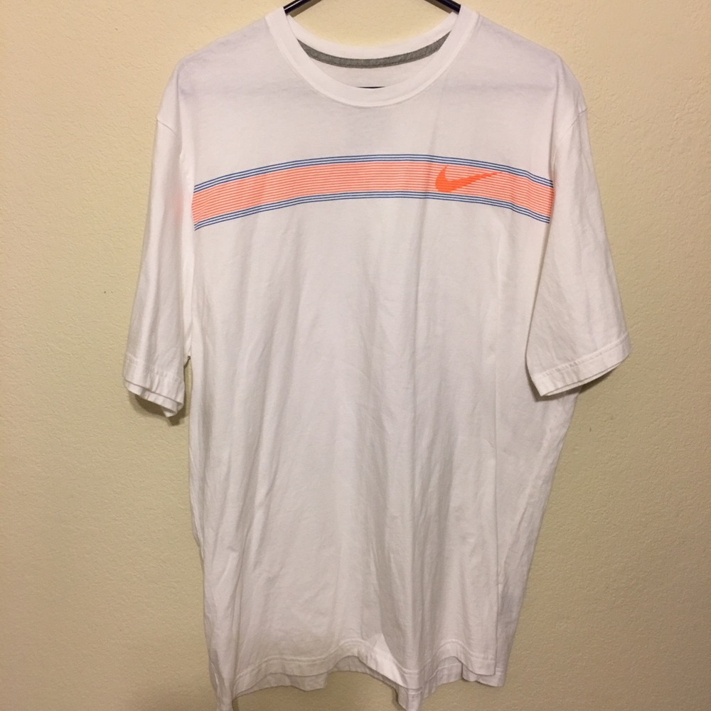 The atheletic dept. men Nike shirt size XXL.